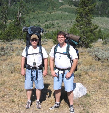 Andrew and Jeff with backpacks on ready to climb the mountain